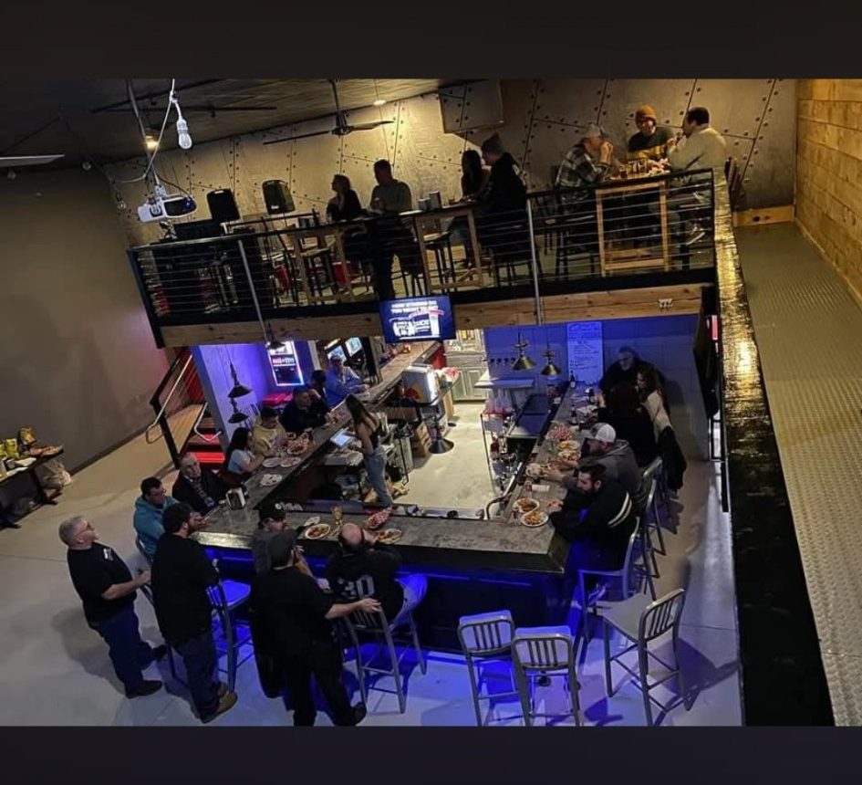 Crowd around the bar at 6ers